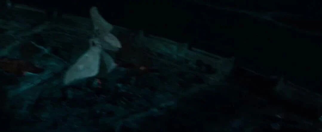 Video still from a Kling 4.0 multi-frame reference test showing four colleagues fighting in a dark office at night